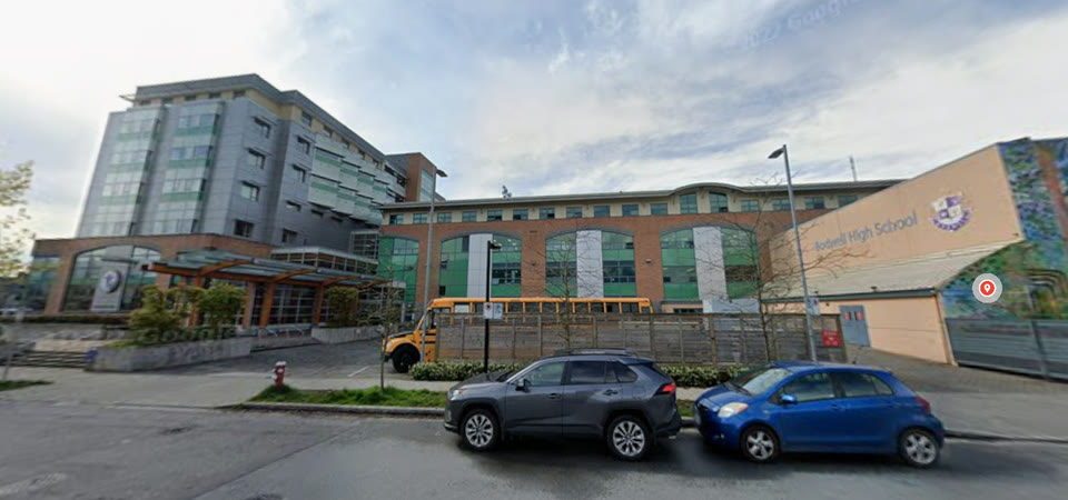 Street view of the entrance and exterior of Bodwell High School.