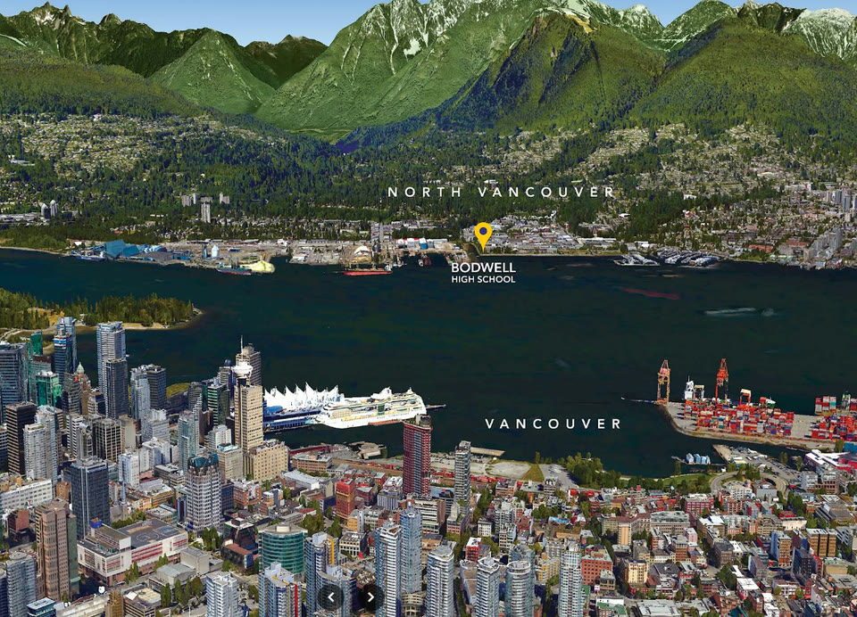 Aerial view showing Bodwell High School in North Vancouver across the harbour from downtown Vancouver.